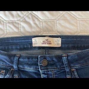 Dark blue low rise skinny jeans